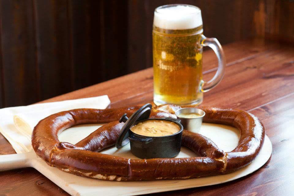 large pretzel with a mug of beer